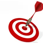 Red target board with dart hitting the center representing accuracy, goals, and digital marketing success